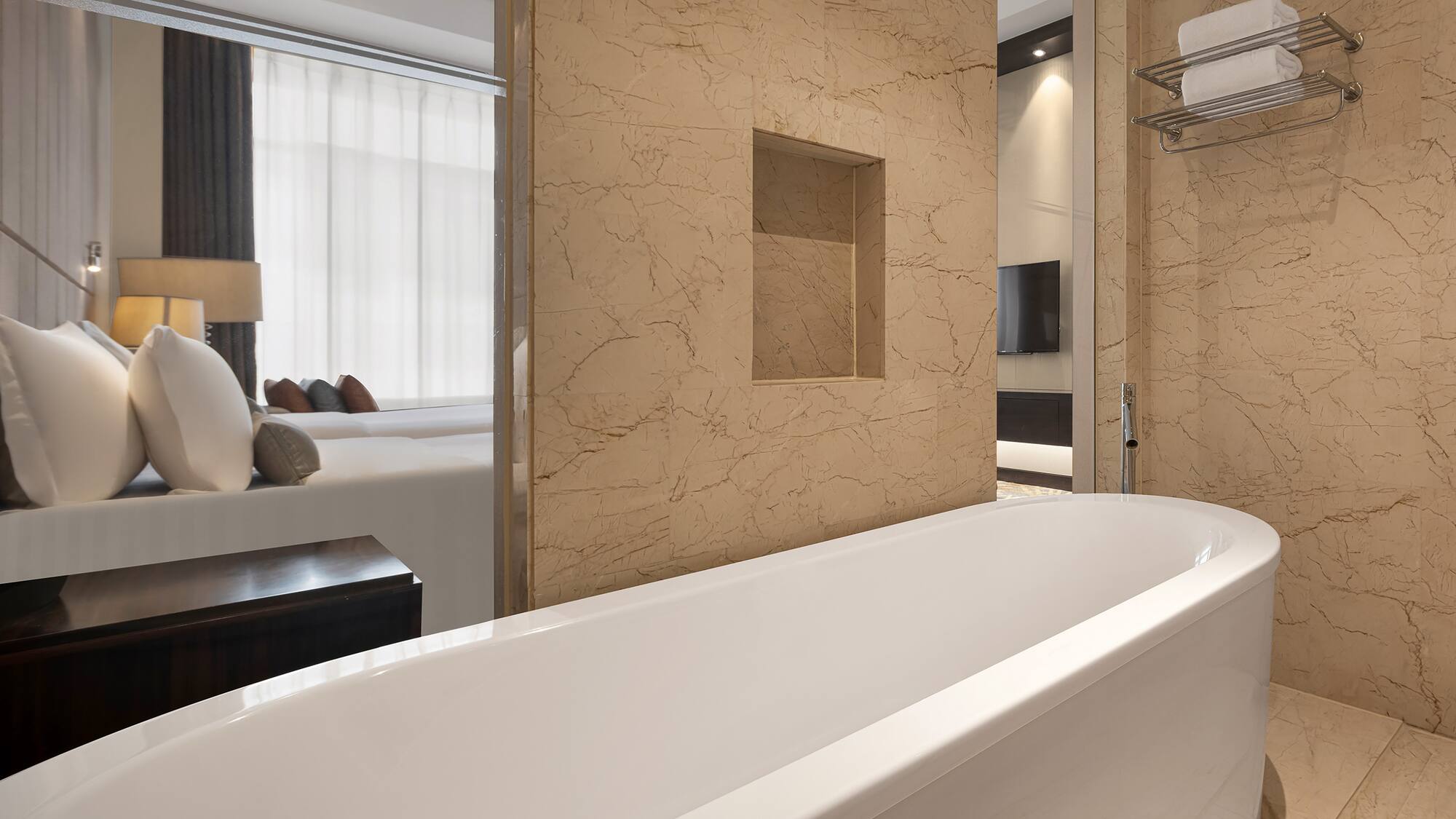 a bathroom with a bathtub and a mirror