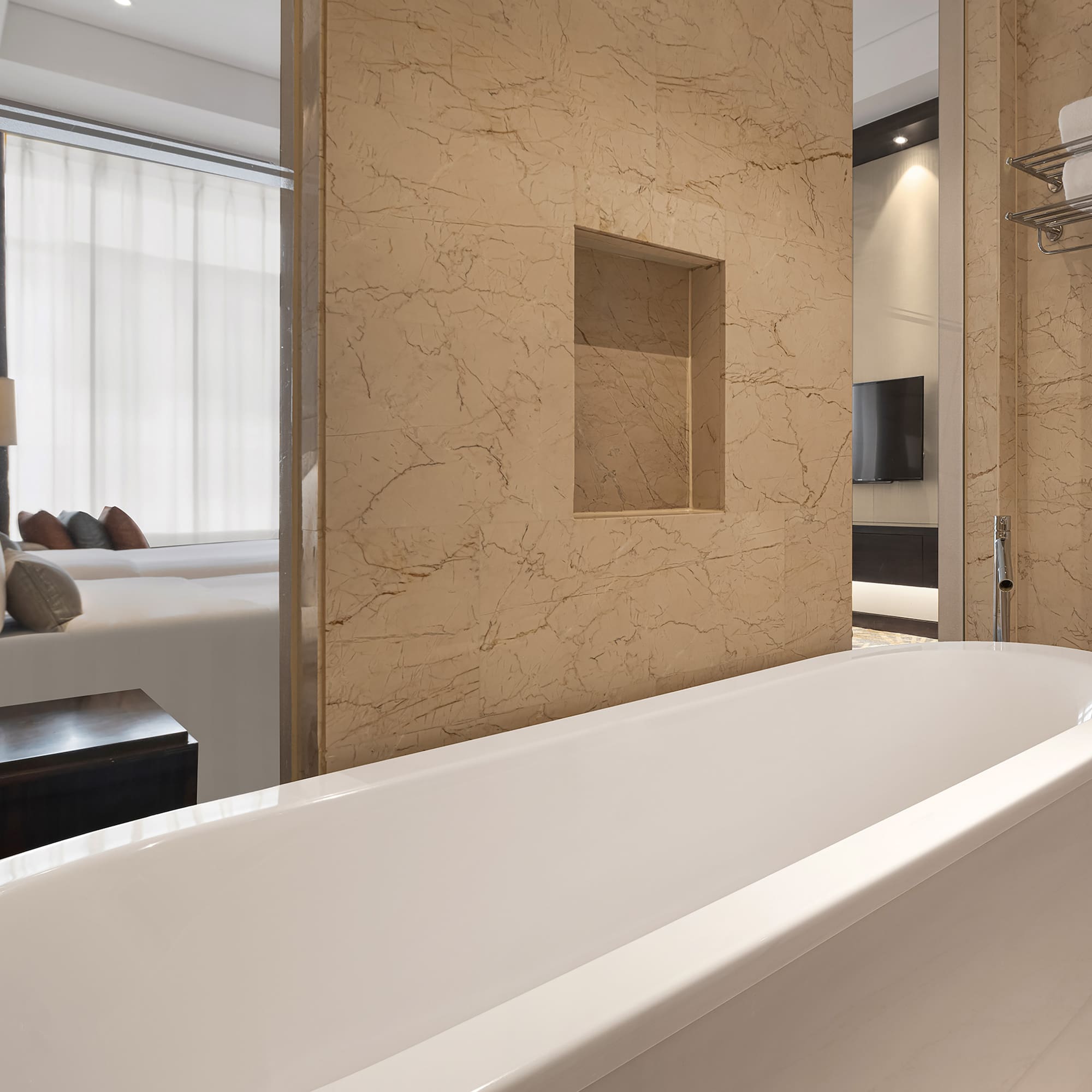 a bathroom with a bathtub and a mirror