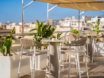 a table and chairs on a patio