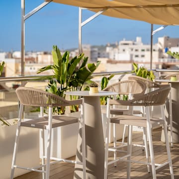 a table and chairs on a patio