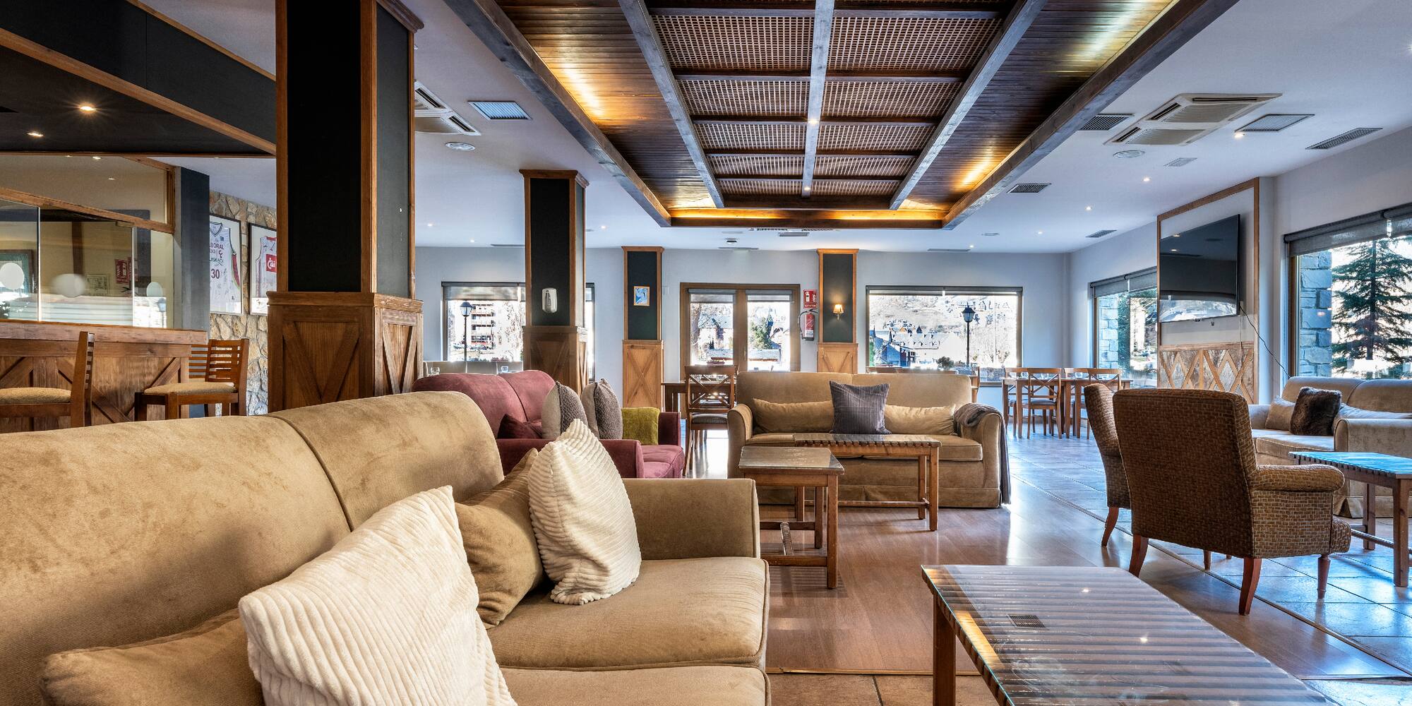 a room with couches and tables