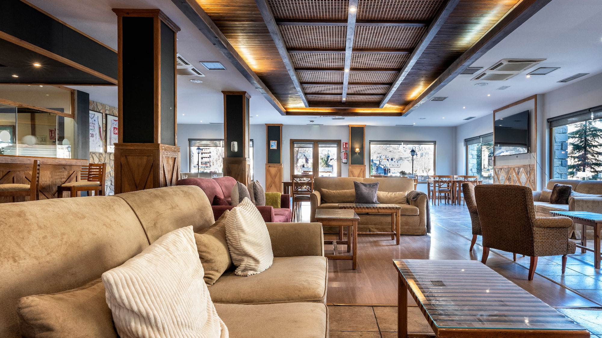 a room with couches and tables