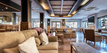 a room with couches and tables