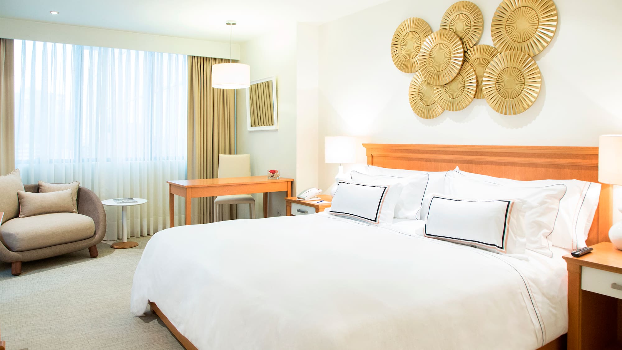 a bedroom with a bed and a desk