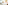 Modern hotel room with king bed, gold wall art, desk, and armchair.
