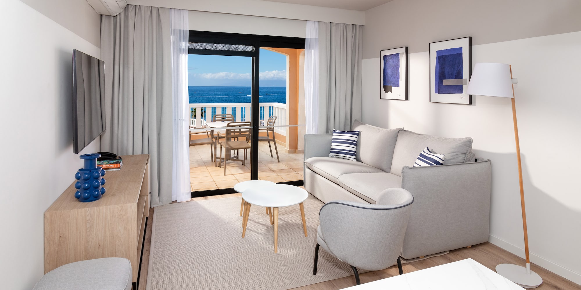 a living room with a couch and a table