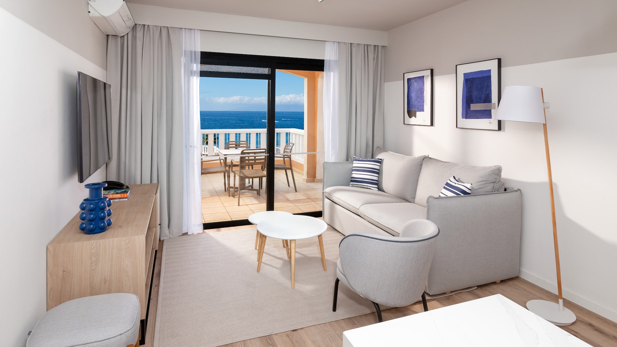 a living room with a couch and a table