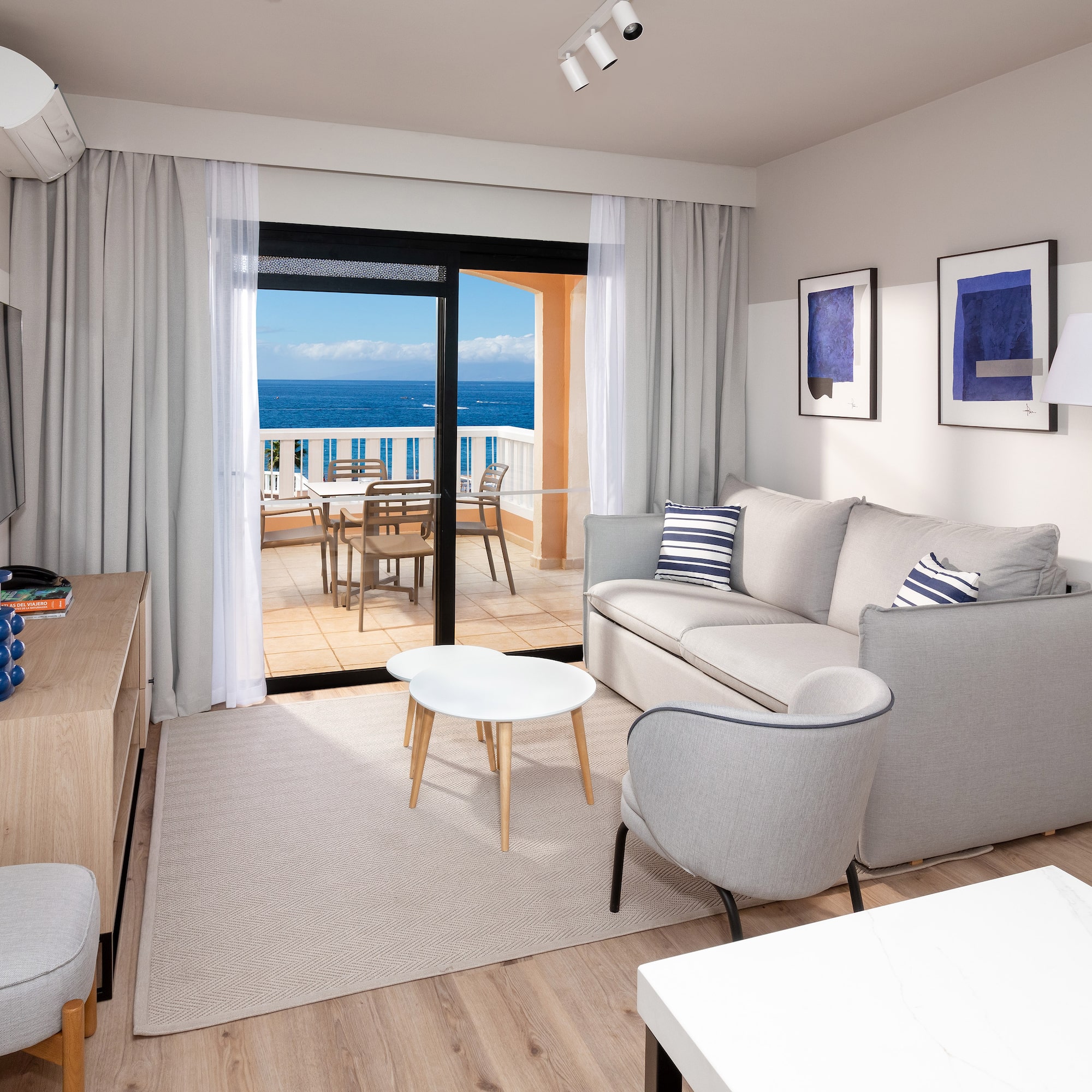 a living room with a couch and a table