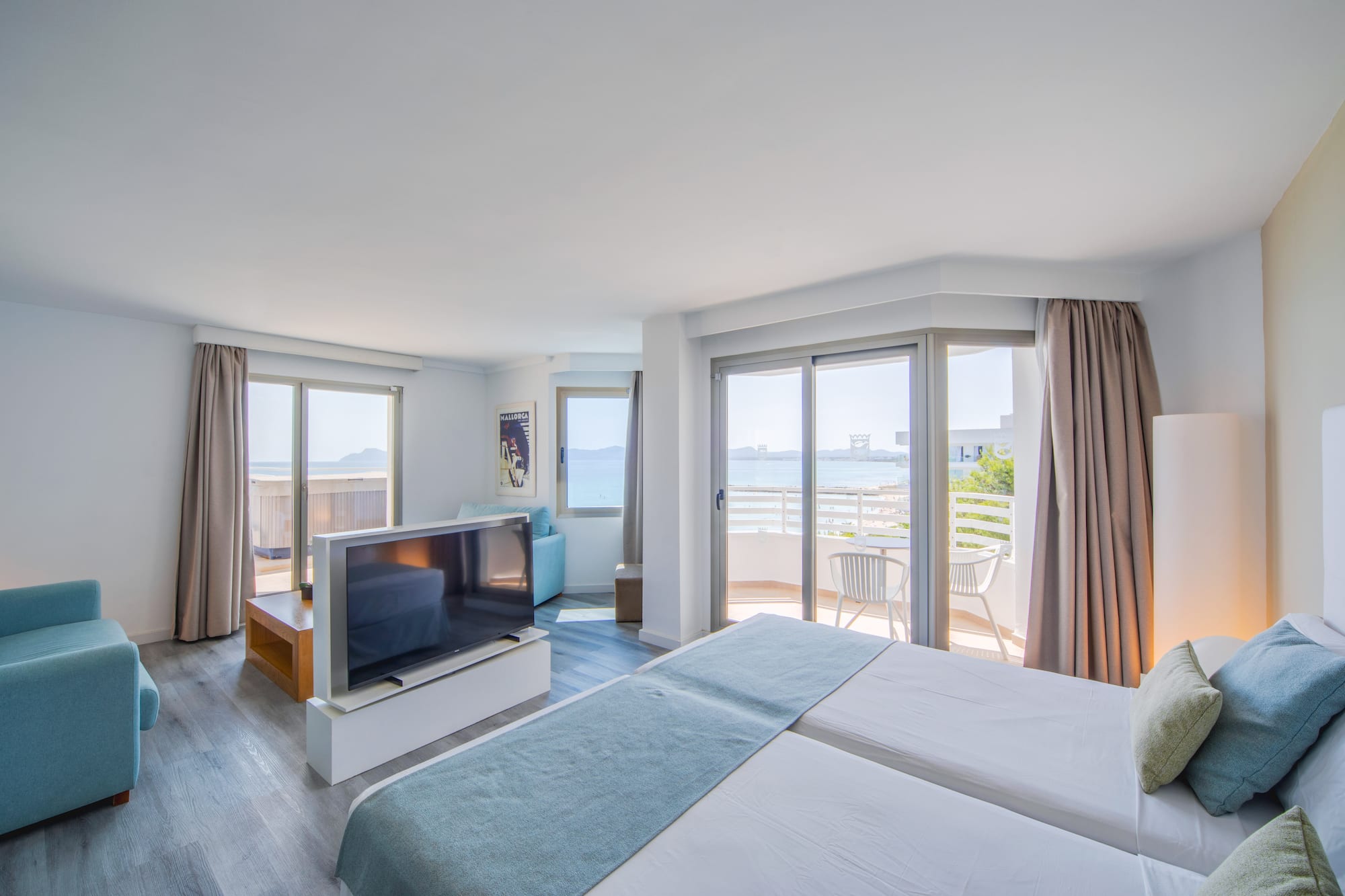 a room with a television and a bed