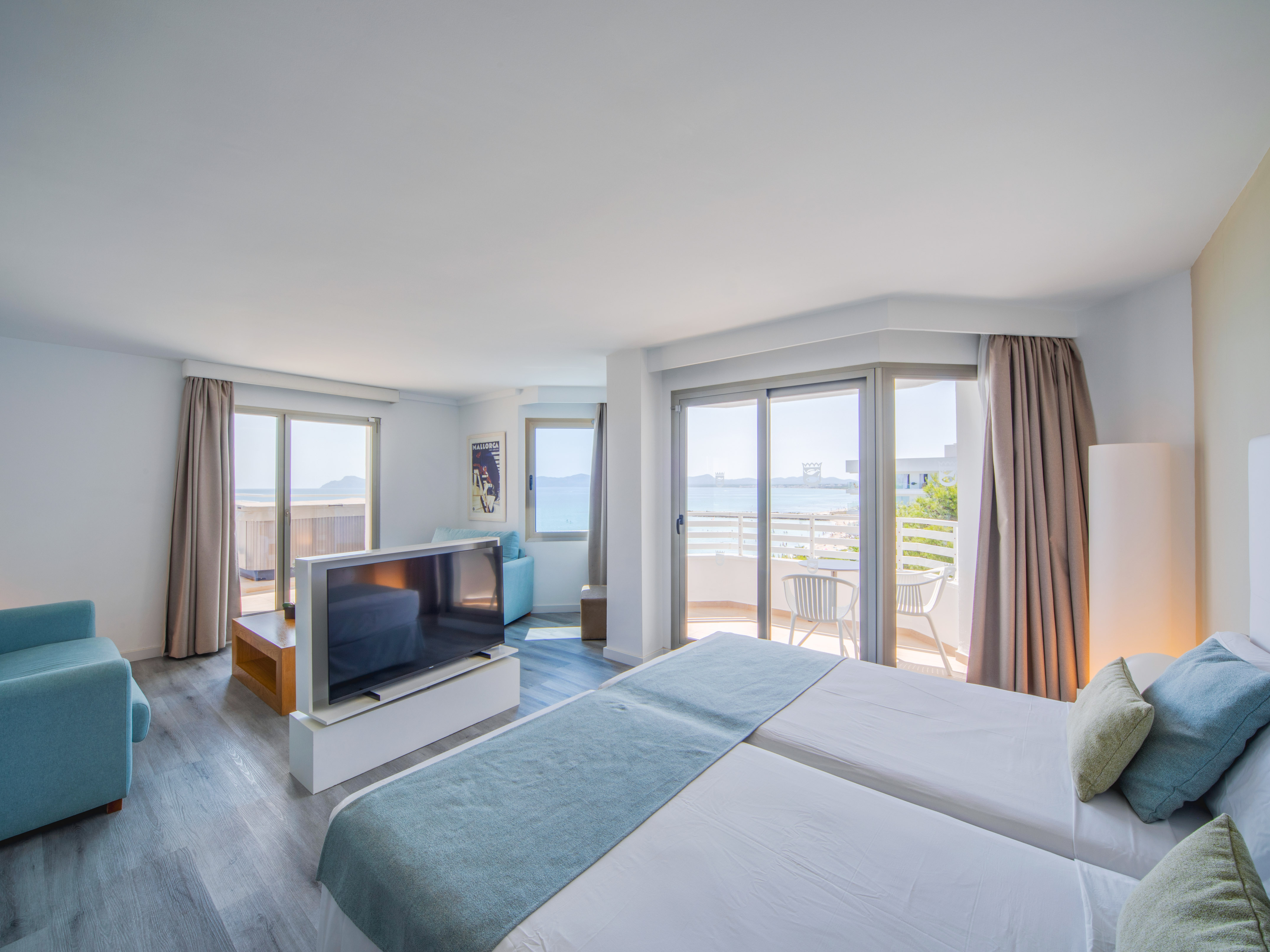 a room with a television and a bed