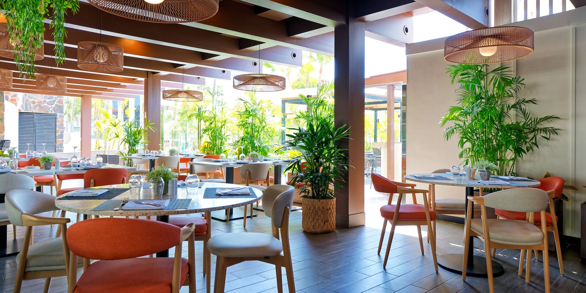 a restaurant with tables and chairs