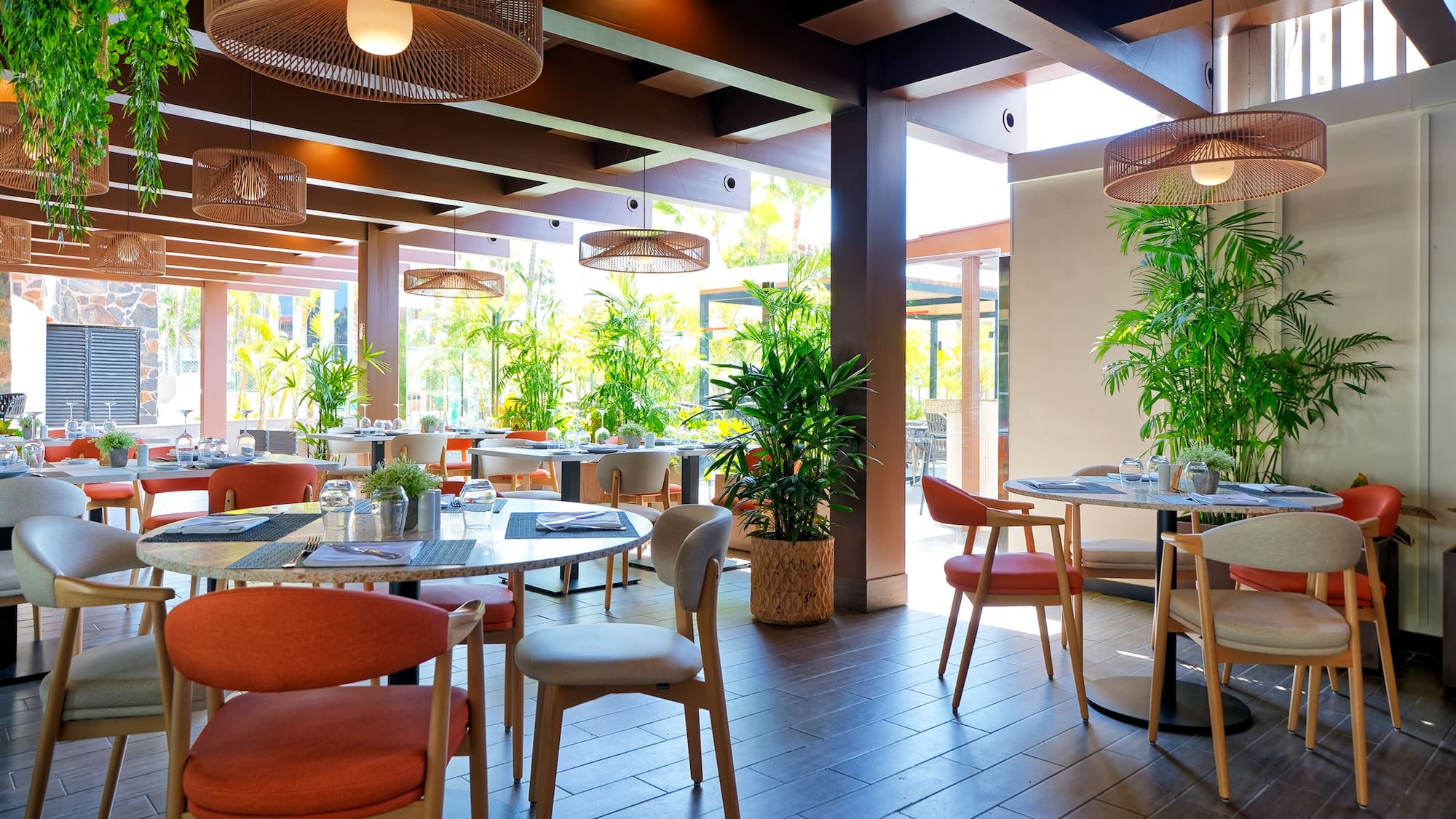 a restaurant with tables and chairs