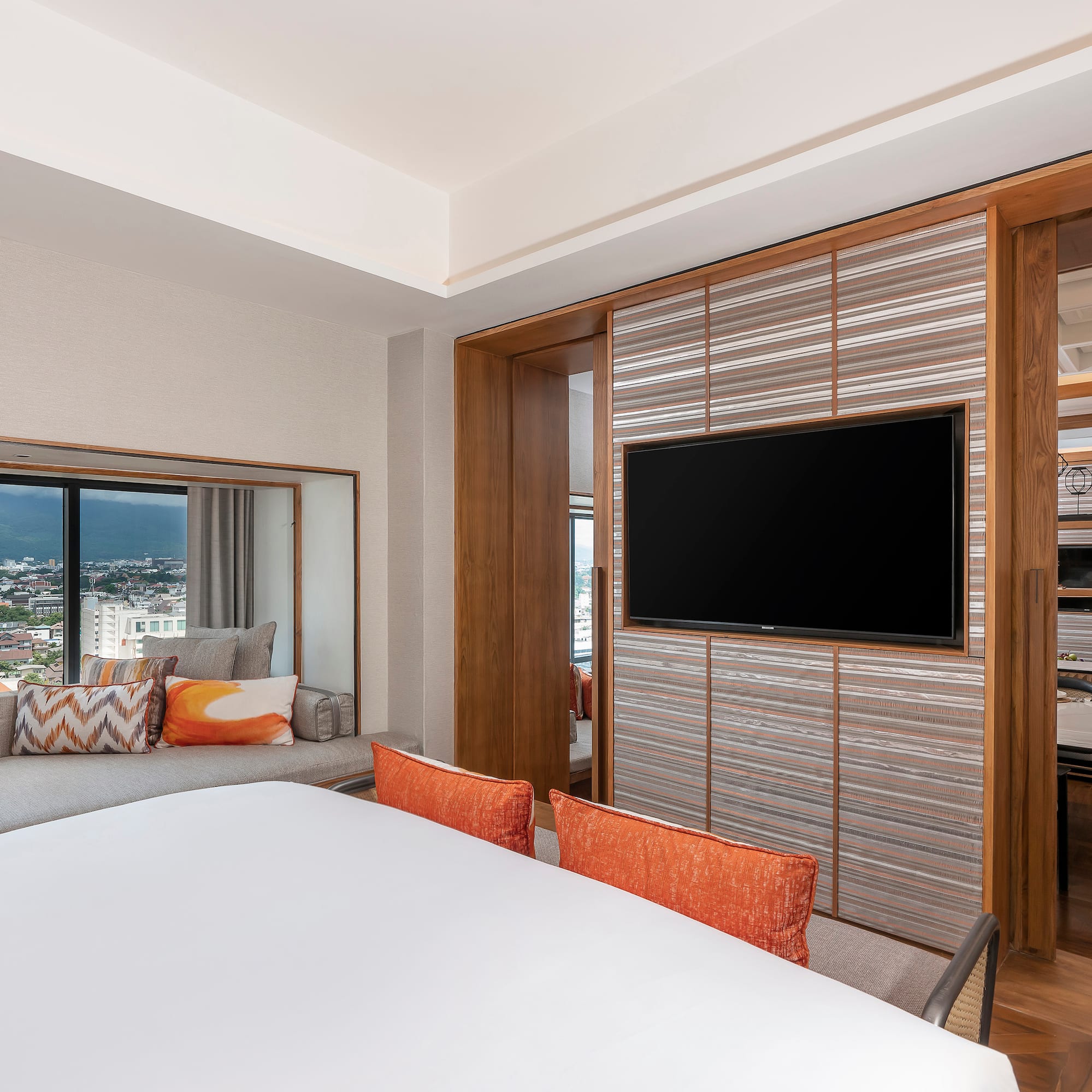 a room with a tv and a couch