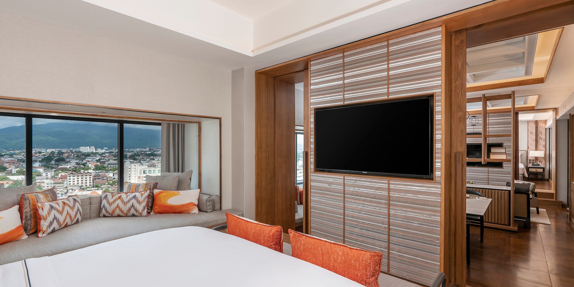 a room with a tv and a couch