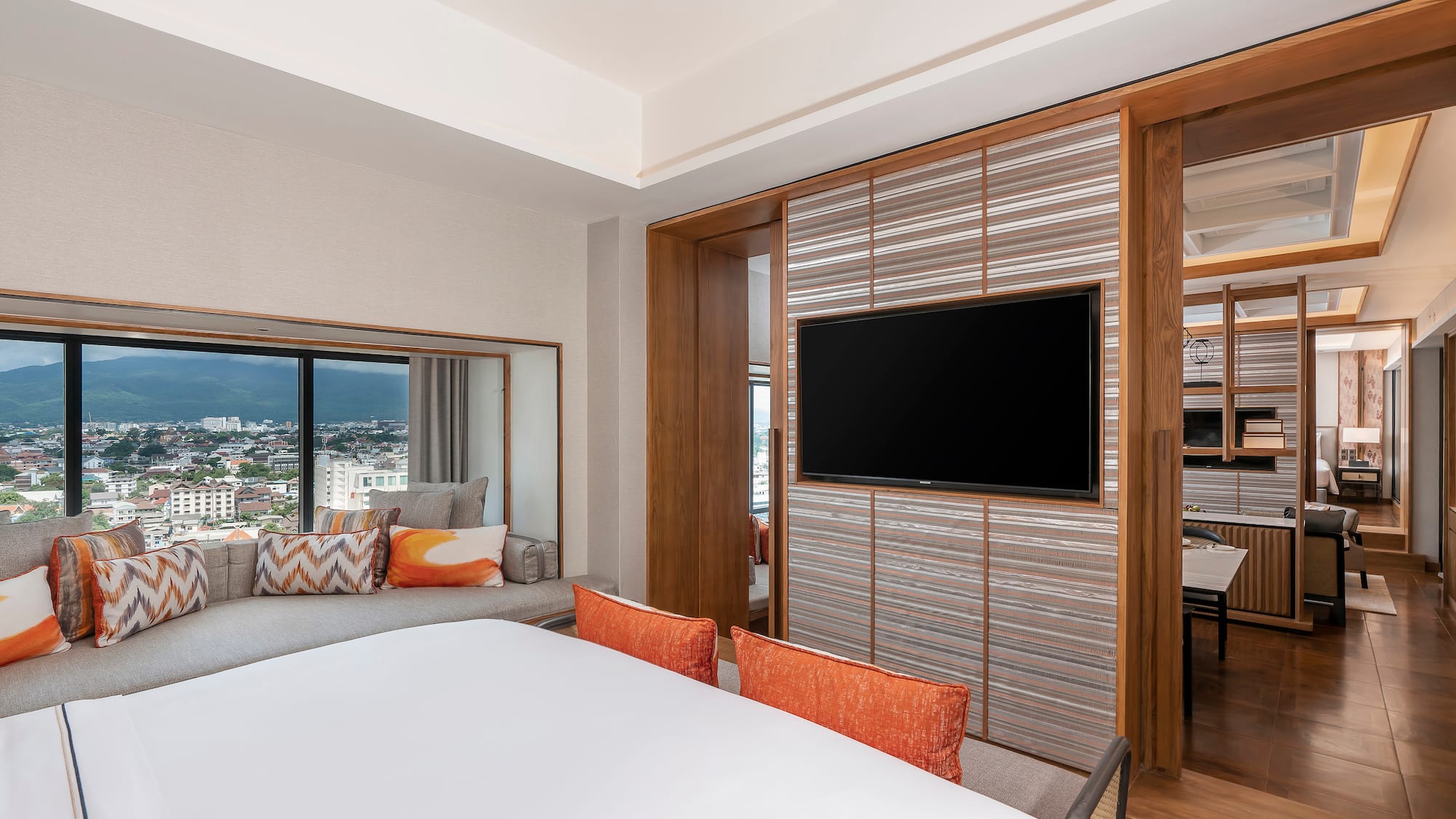 a room with a tv and a couch