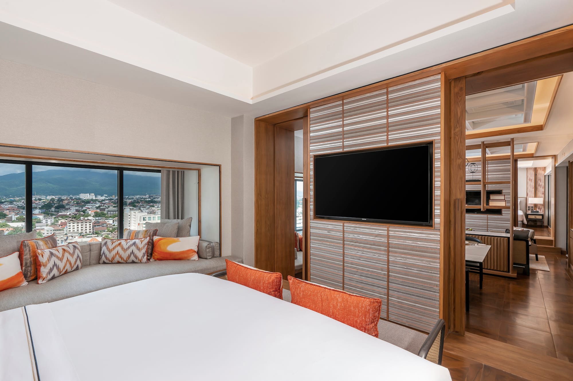 a room with a tv and a couch