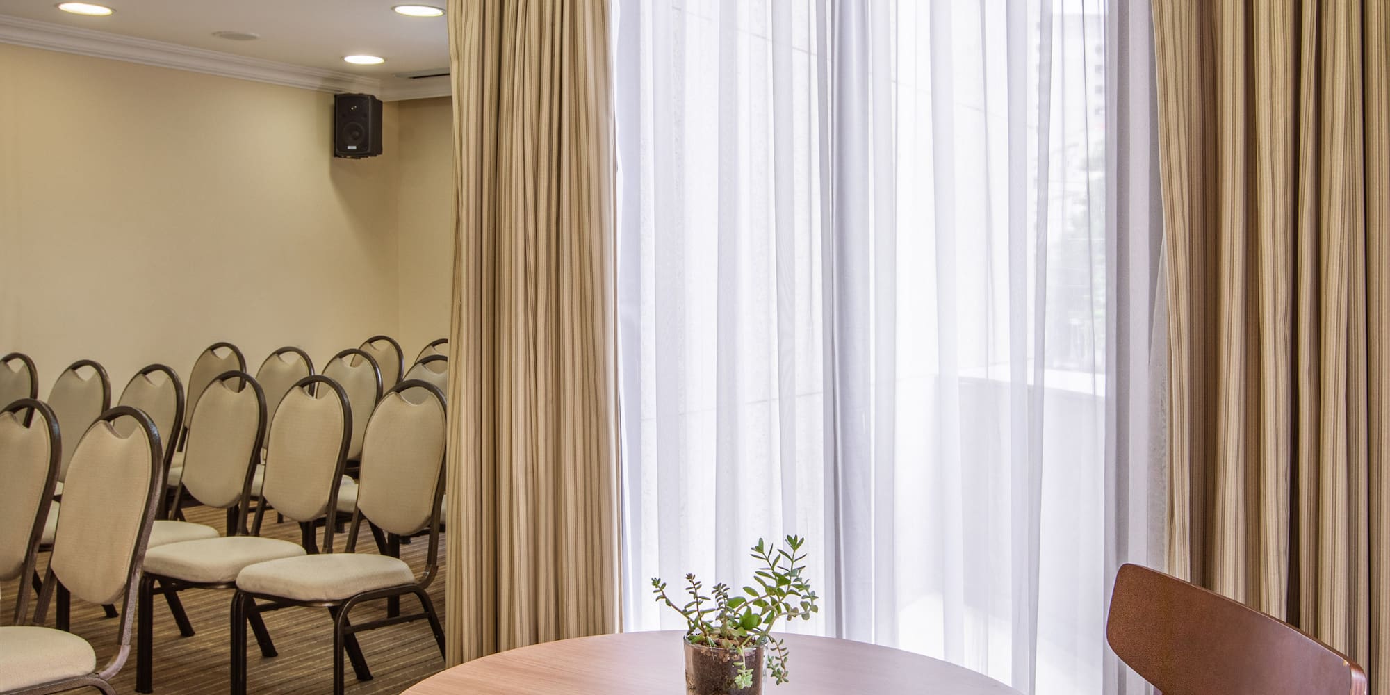 a room with a table and chairs