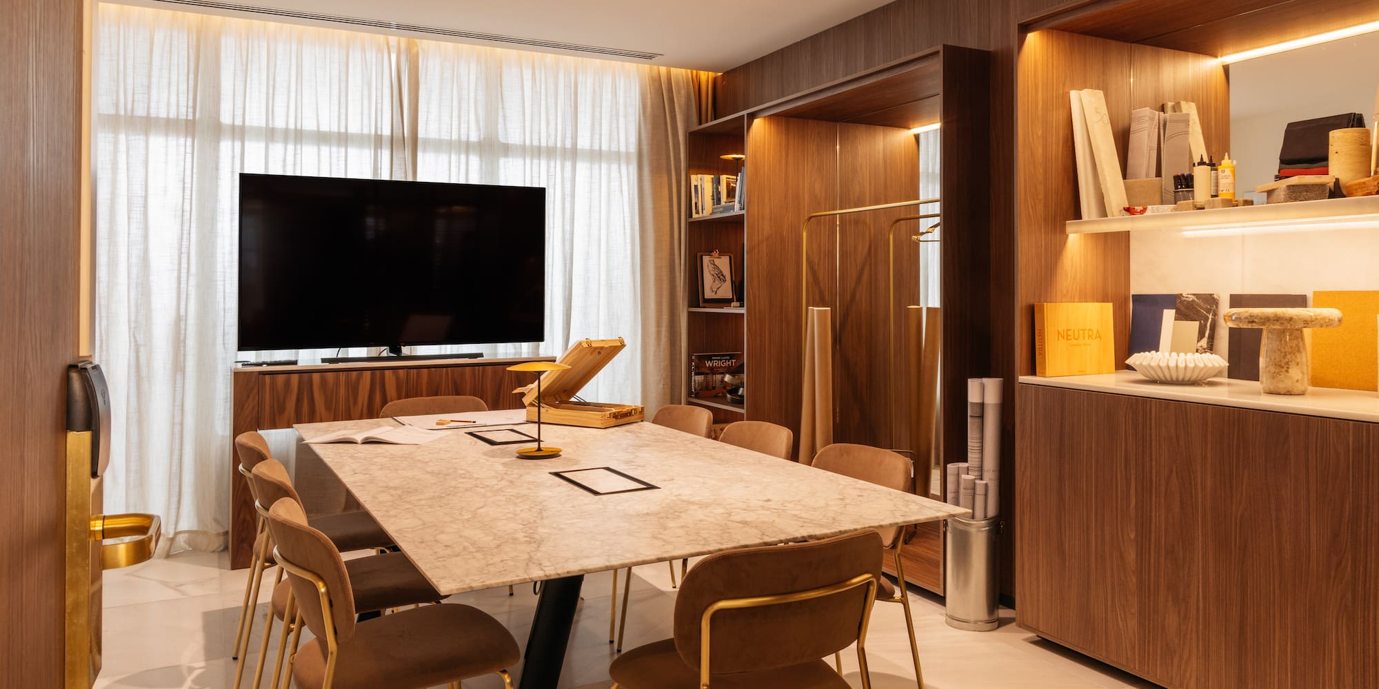 a room with a table and chairs