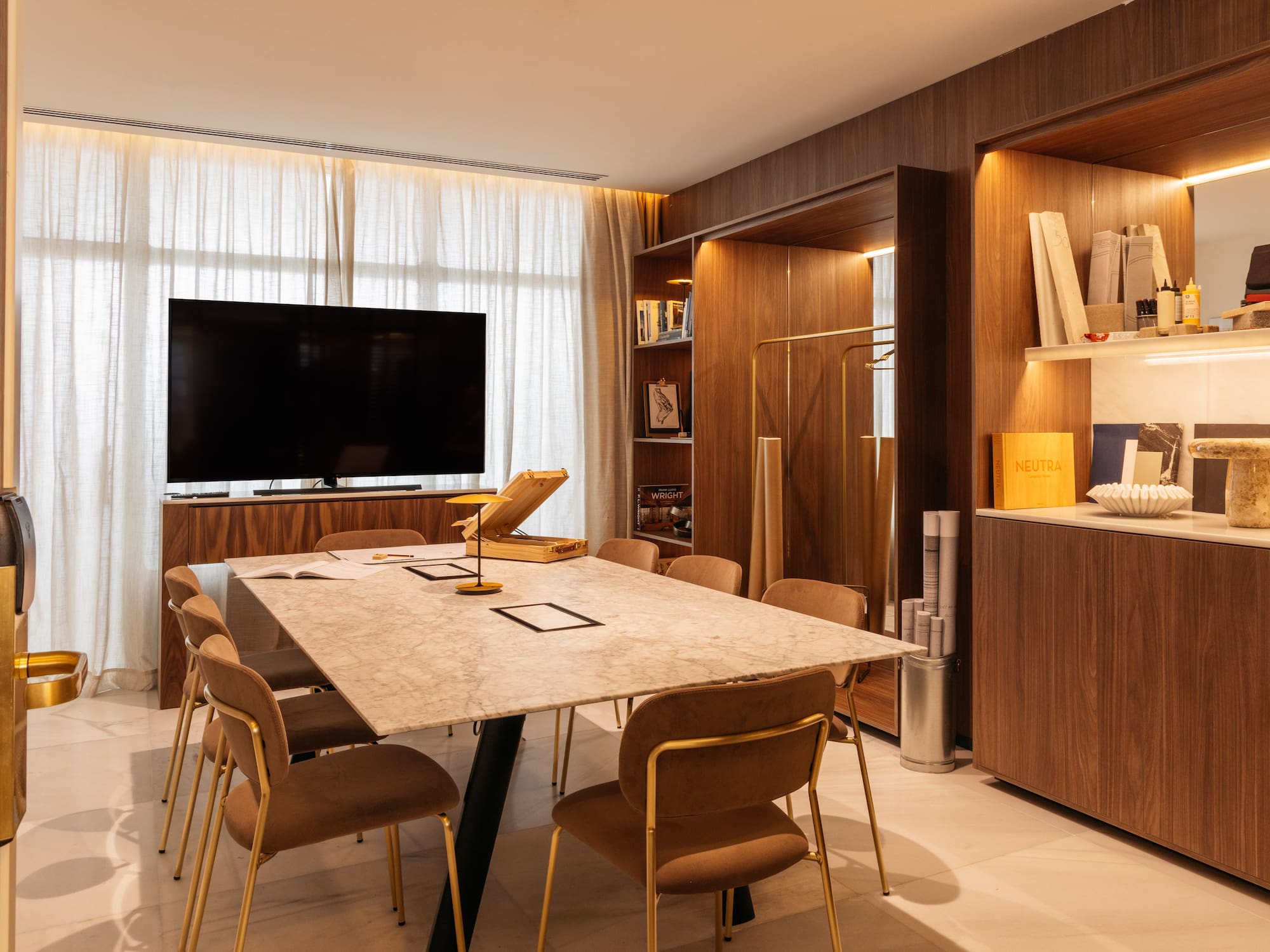 a room with a table and chairs