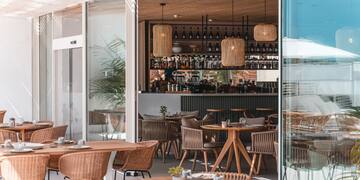 a restaurant with tables and chairs