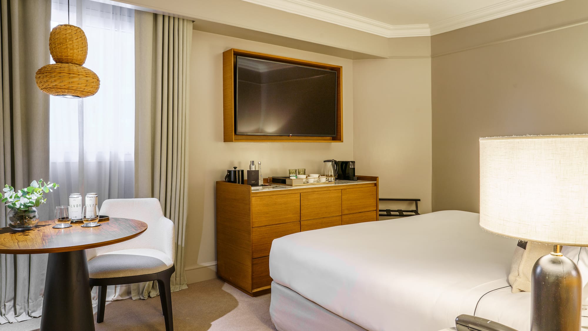 a room with a bed and a tv