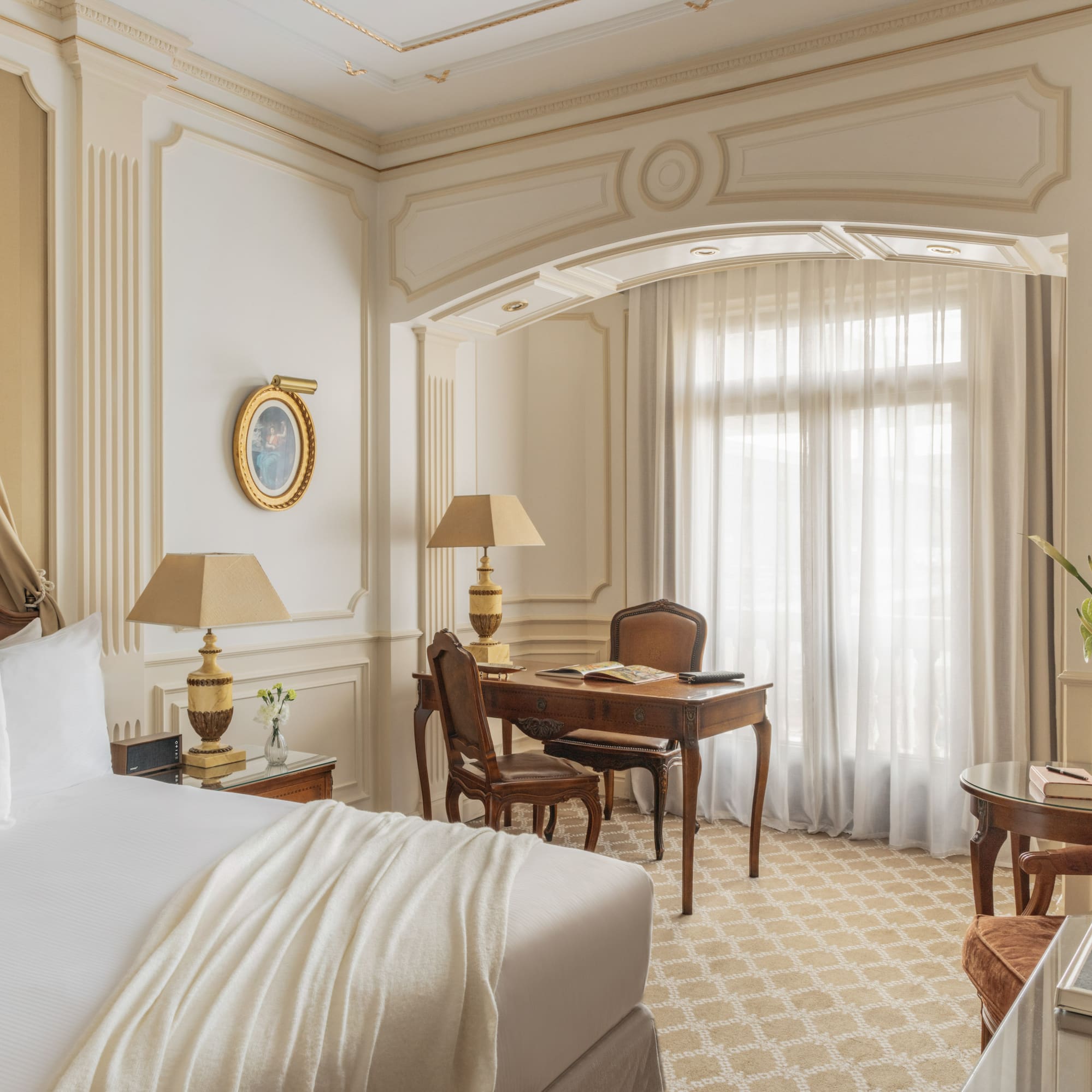 a room with a bed and a desk