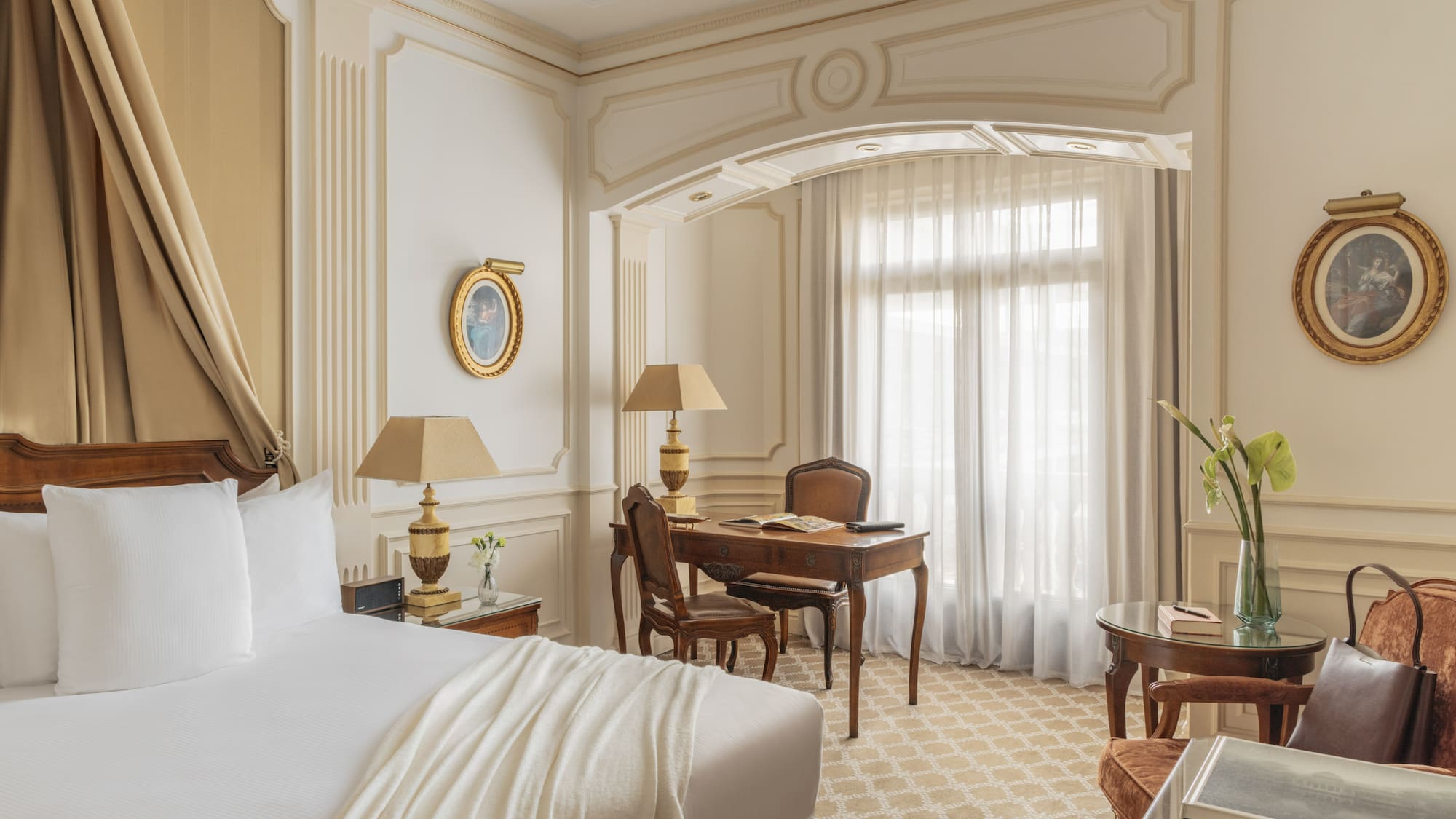 a room with a bed and a desk