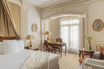 a room with a bed and a desk