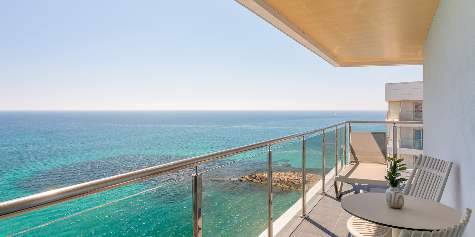 a balcony overlooking the ocean