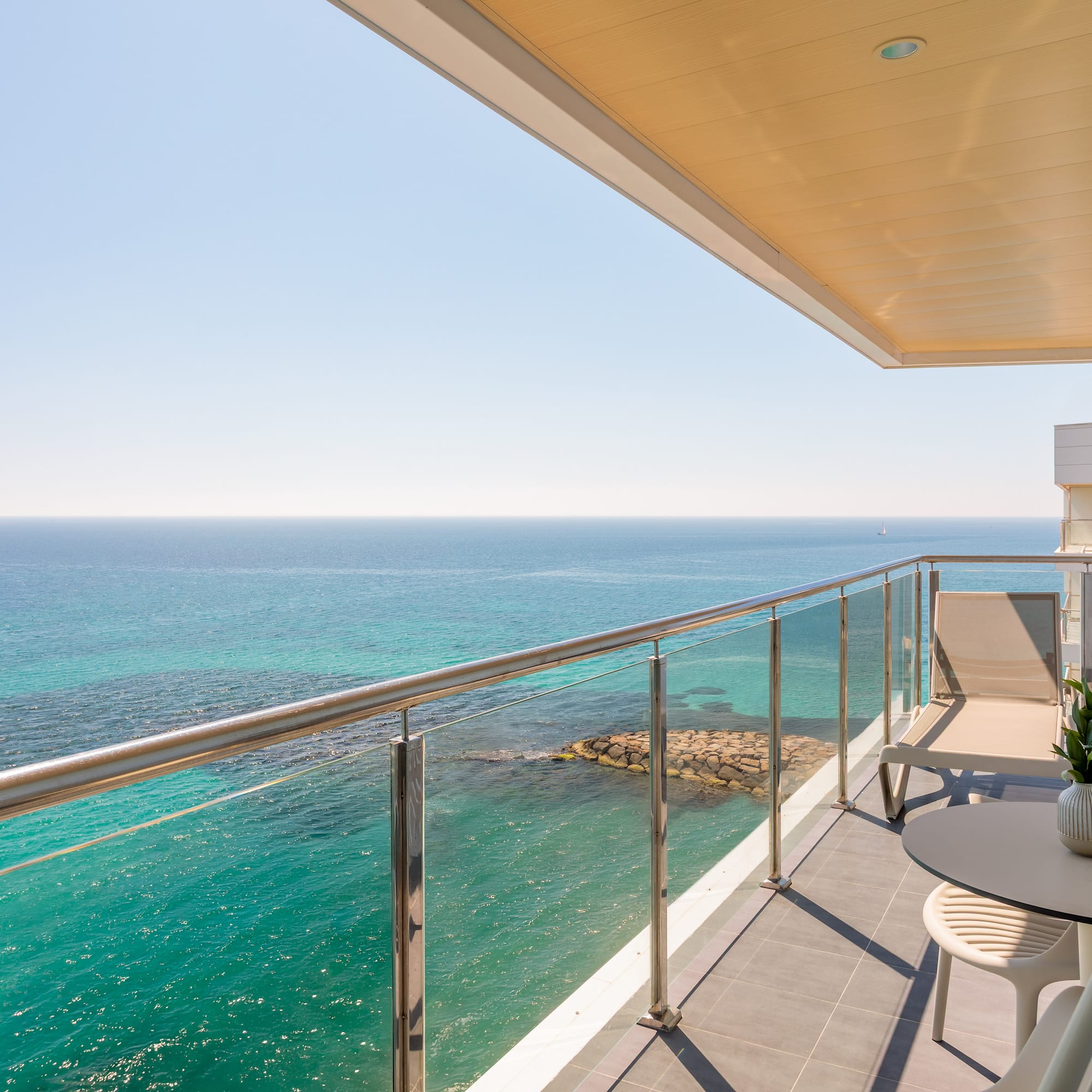 a balcony overlooking the ocean