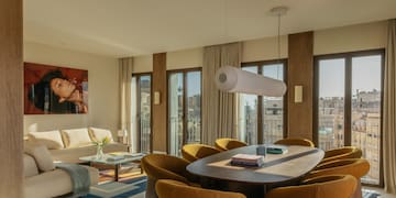 a room with a table and chairs