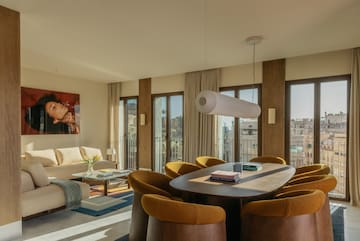 a room with a table and chairs