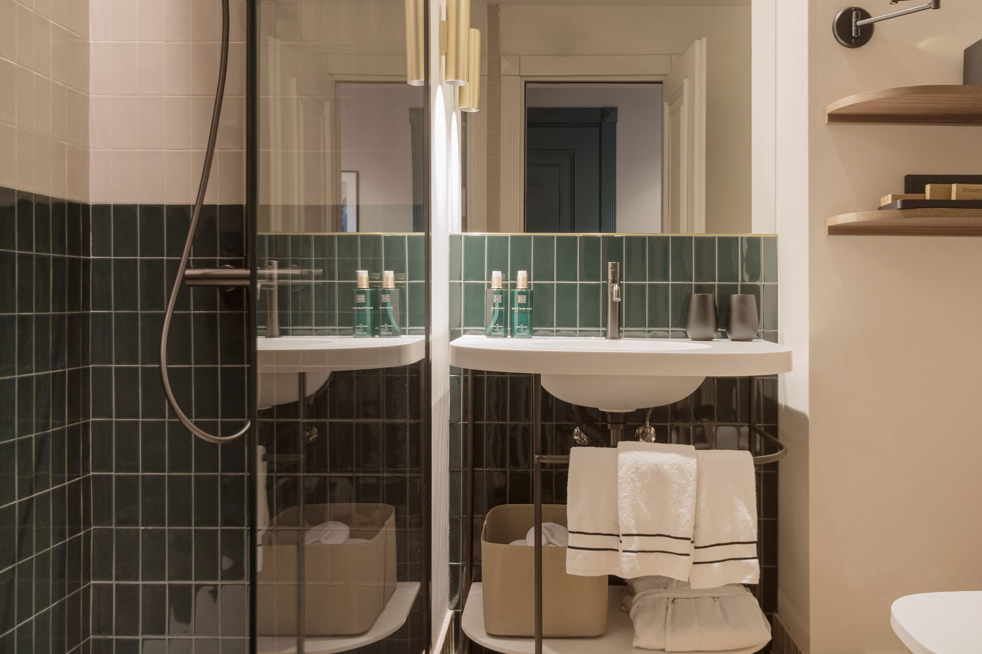 a bathroom with a glass shower door