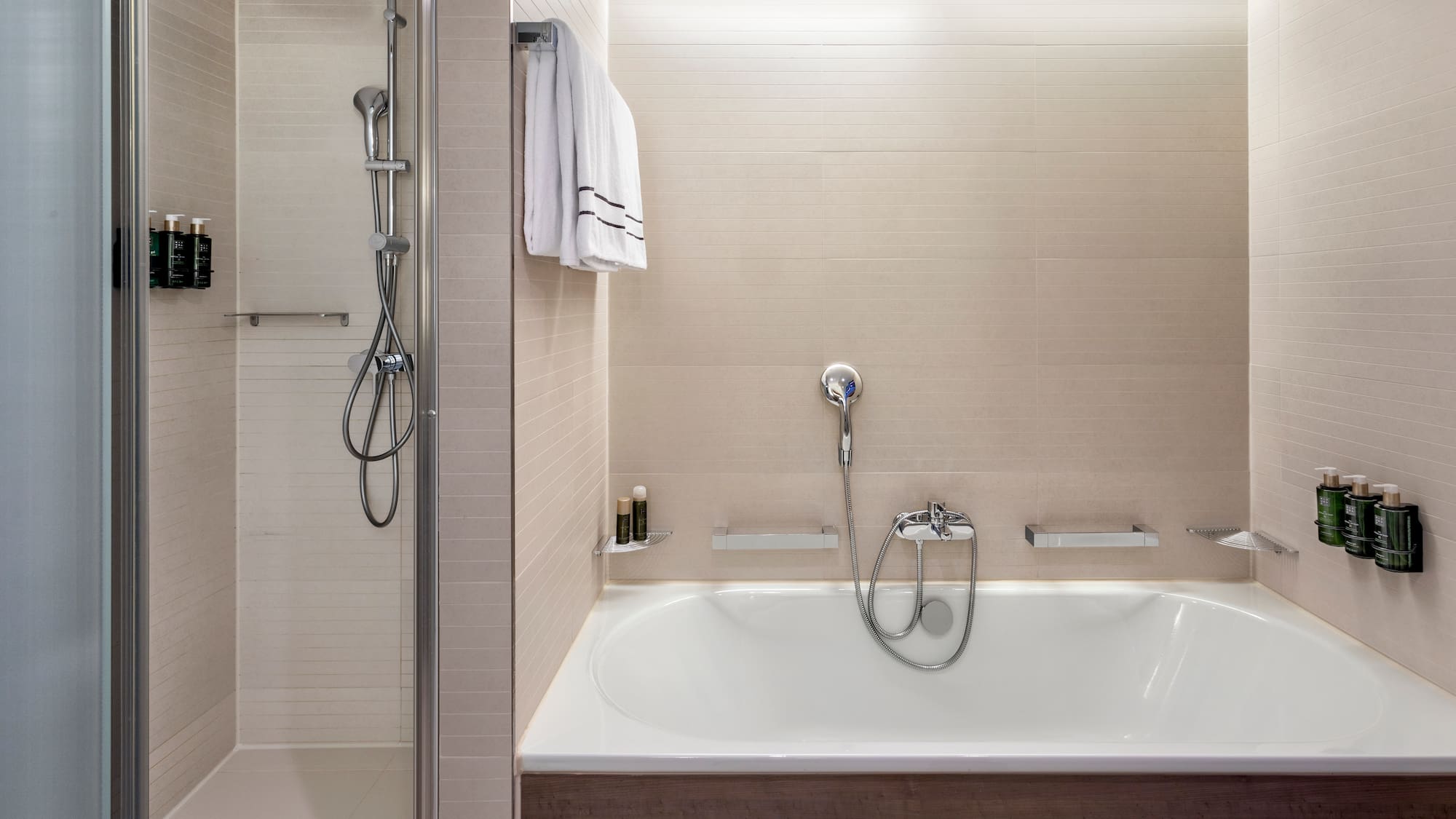 a bathtub and shower in a bathroom