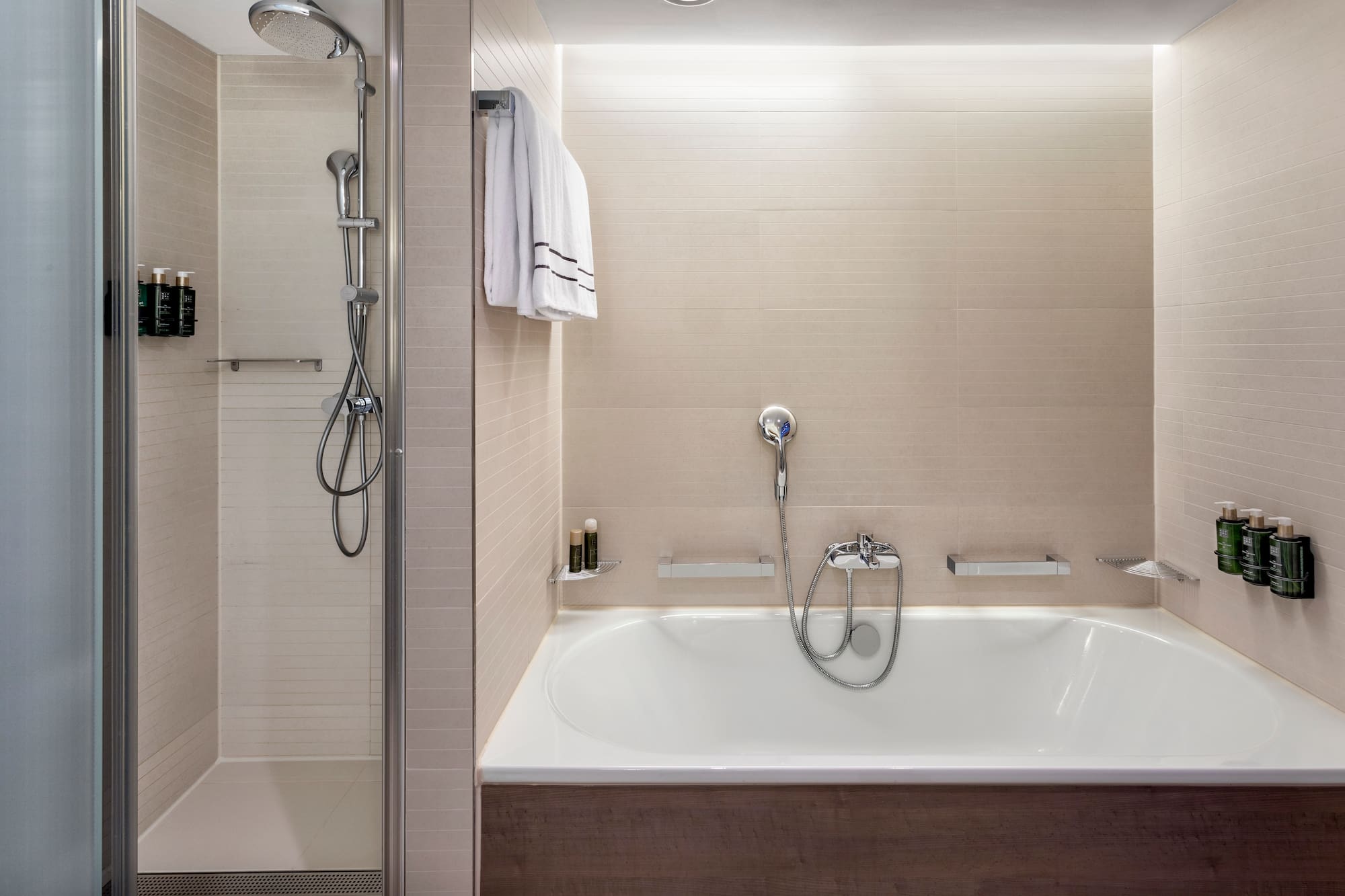 a bathtub and shower in a bathroom