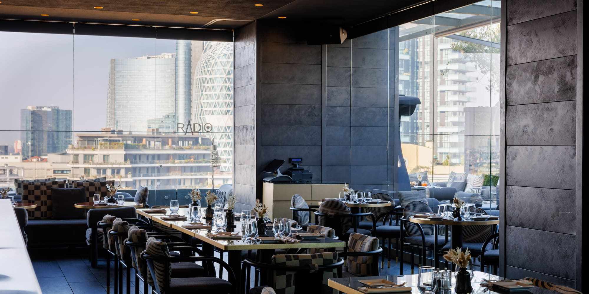 a restaurant with tables and chairs