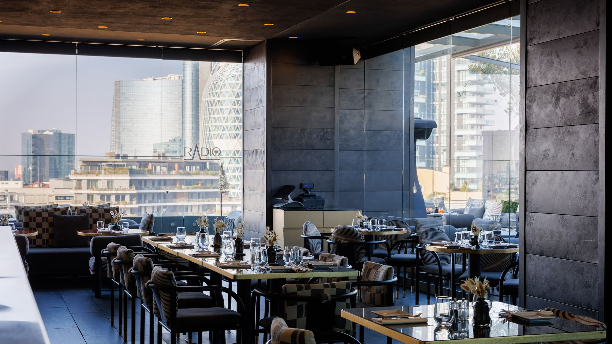 a restaurant with tables and chairs
