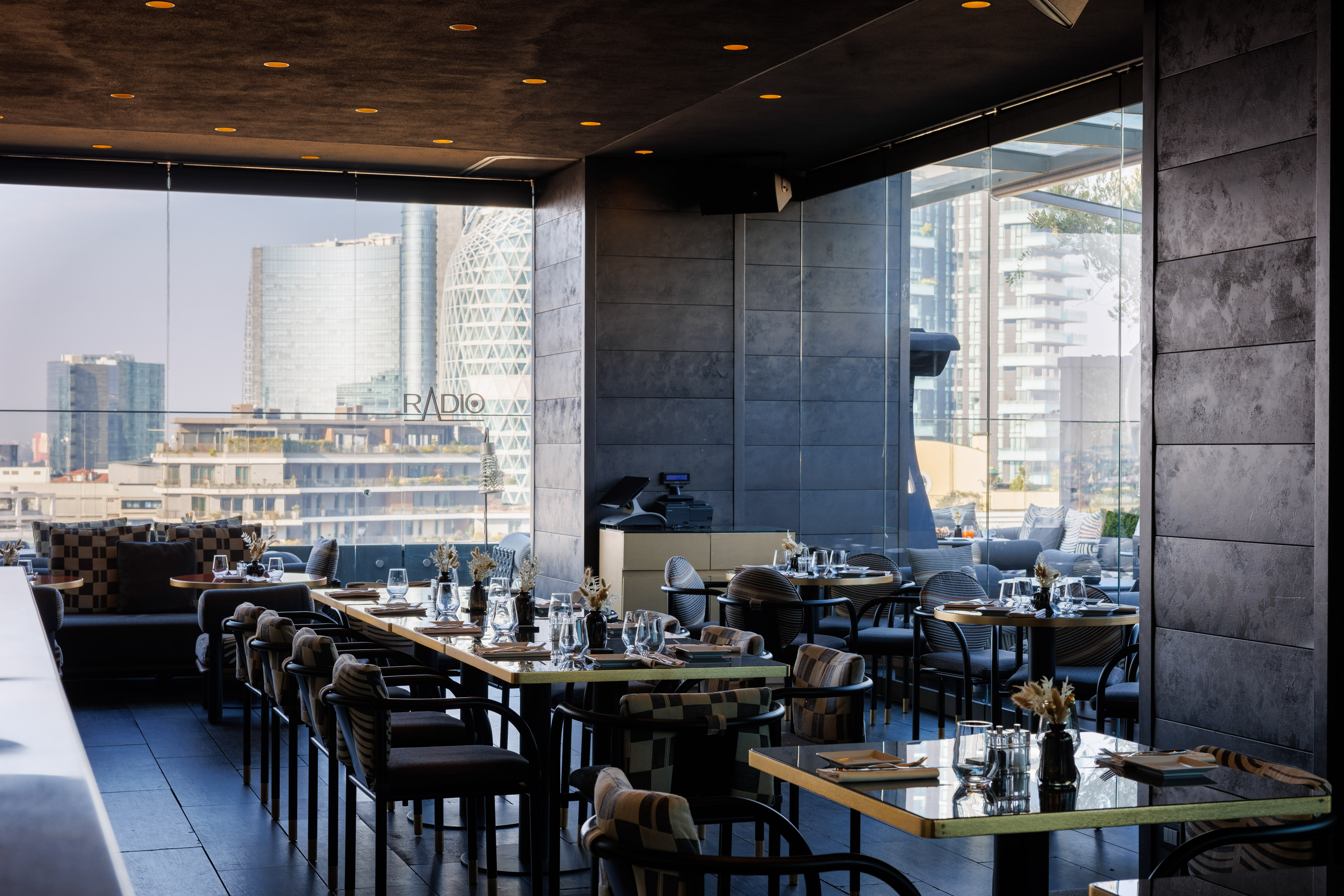 a restaurant with tables and chairs