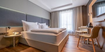 a room with a bed and a table