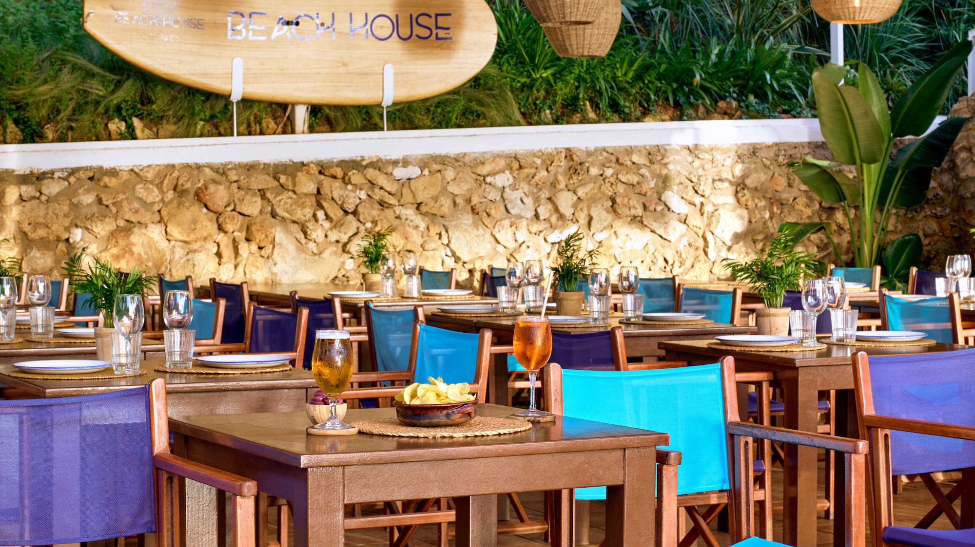 a restaurant with tables and chairs