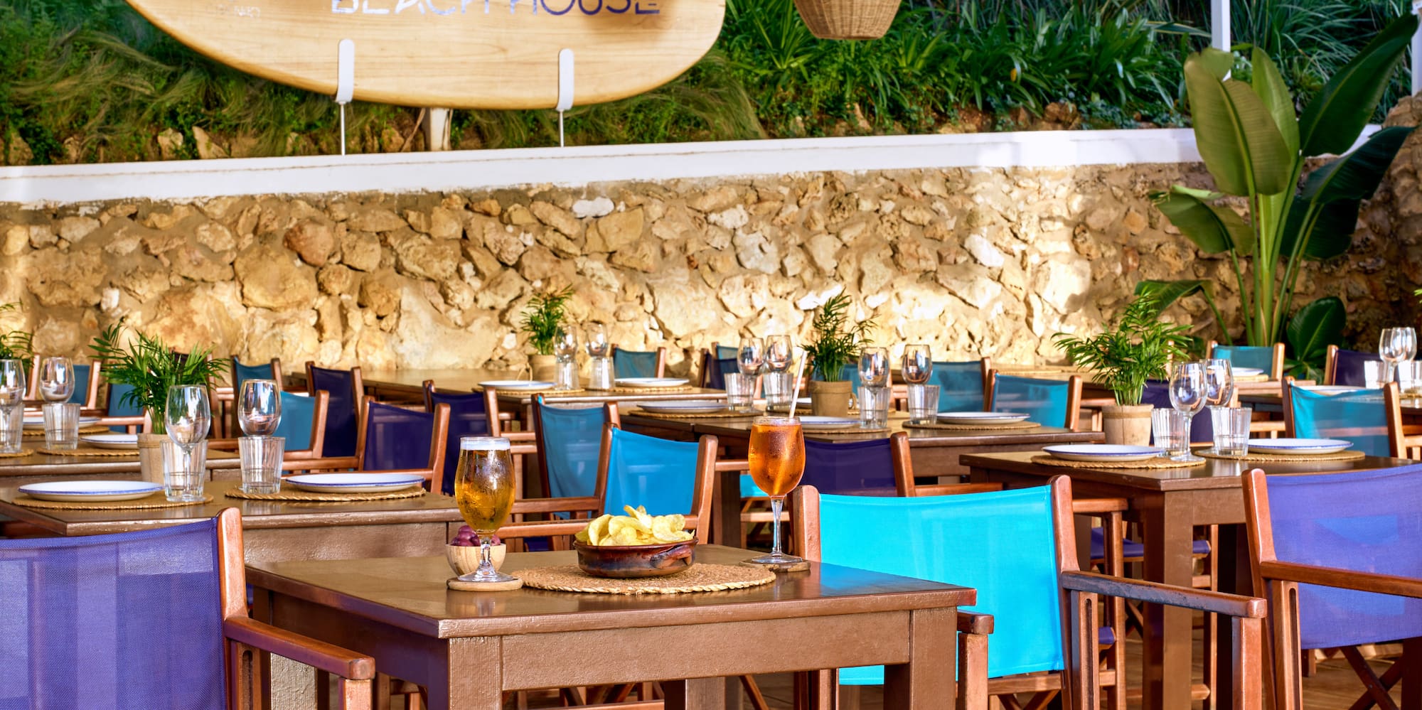 a restaurant with tables and chairs