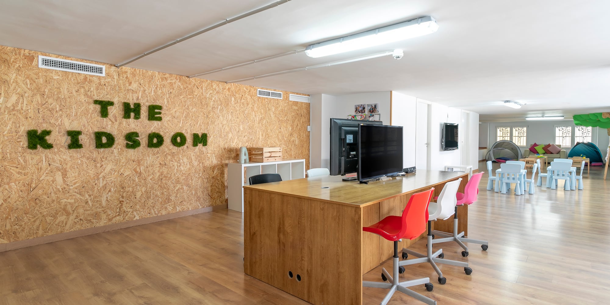 a room with a table and chairs