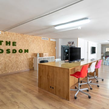 a room with a table and chairs