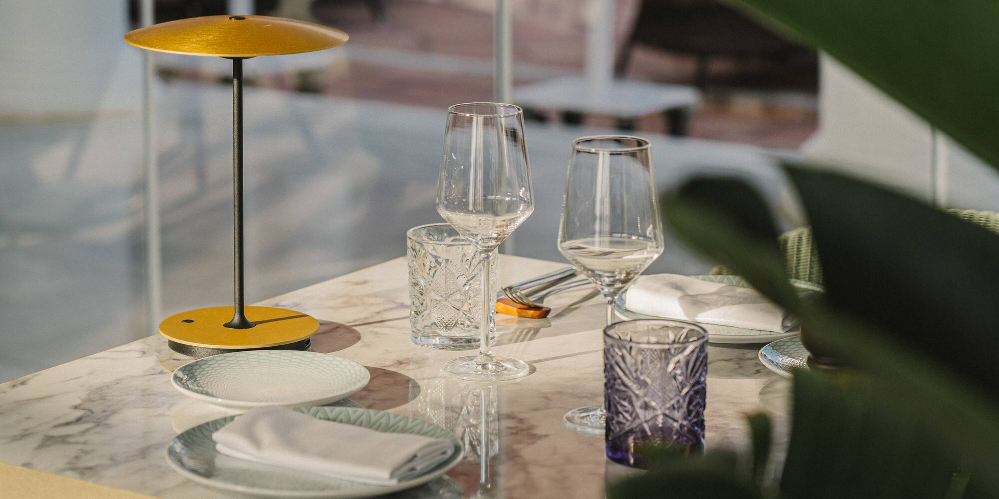 a table with plates and glasses on it
