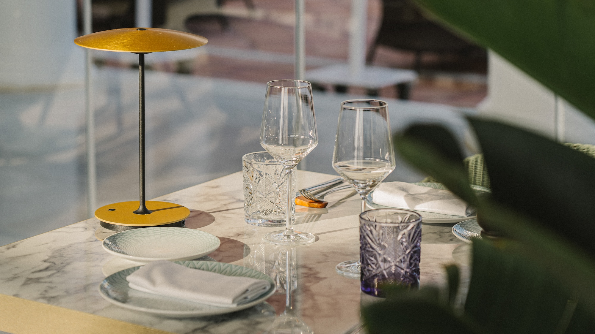 a table with plates and glasses on it