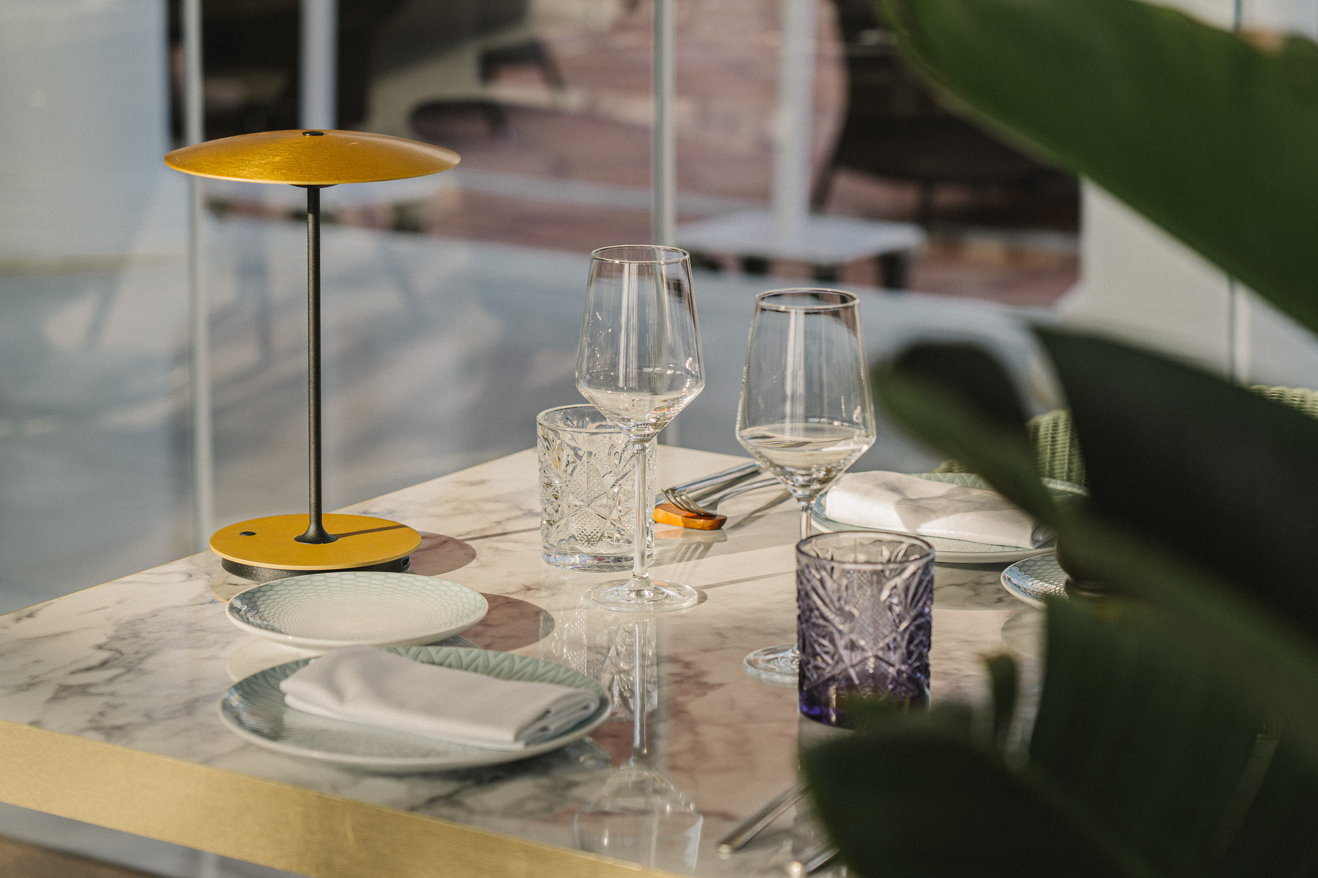 a table with plates and glasses on it