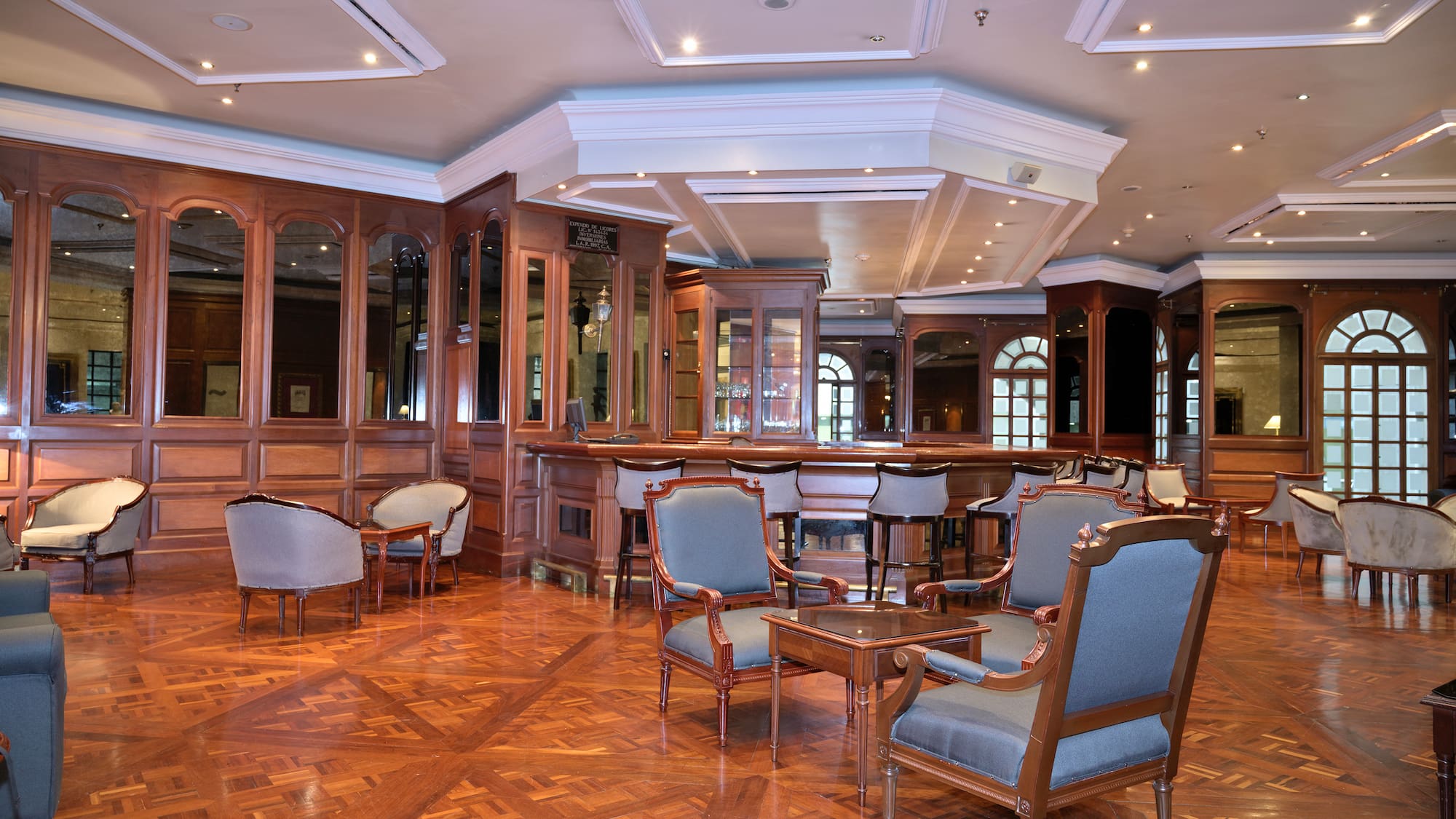 a room with chairs and tables