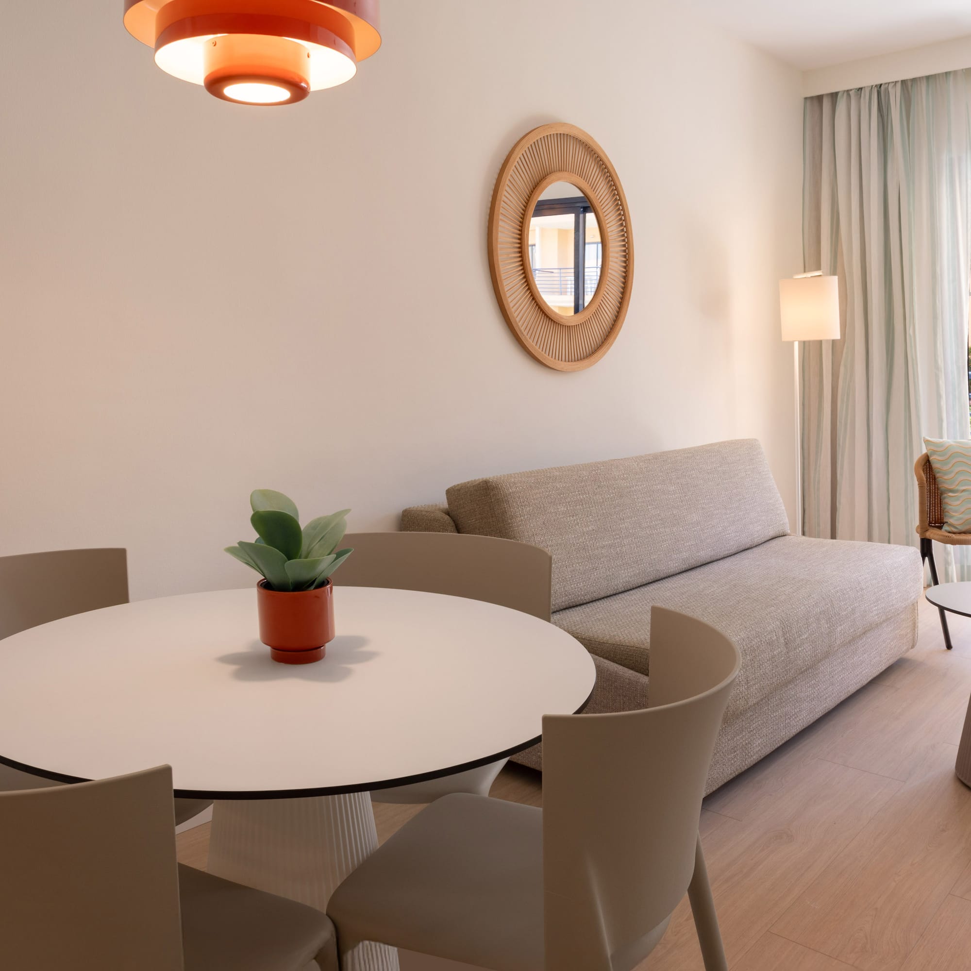 a living room with a couch and a table