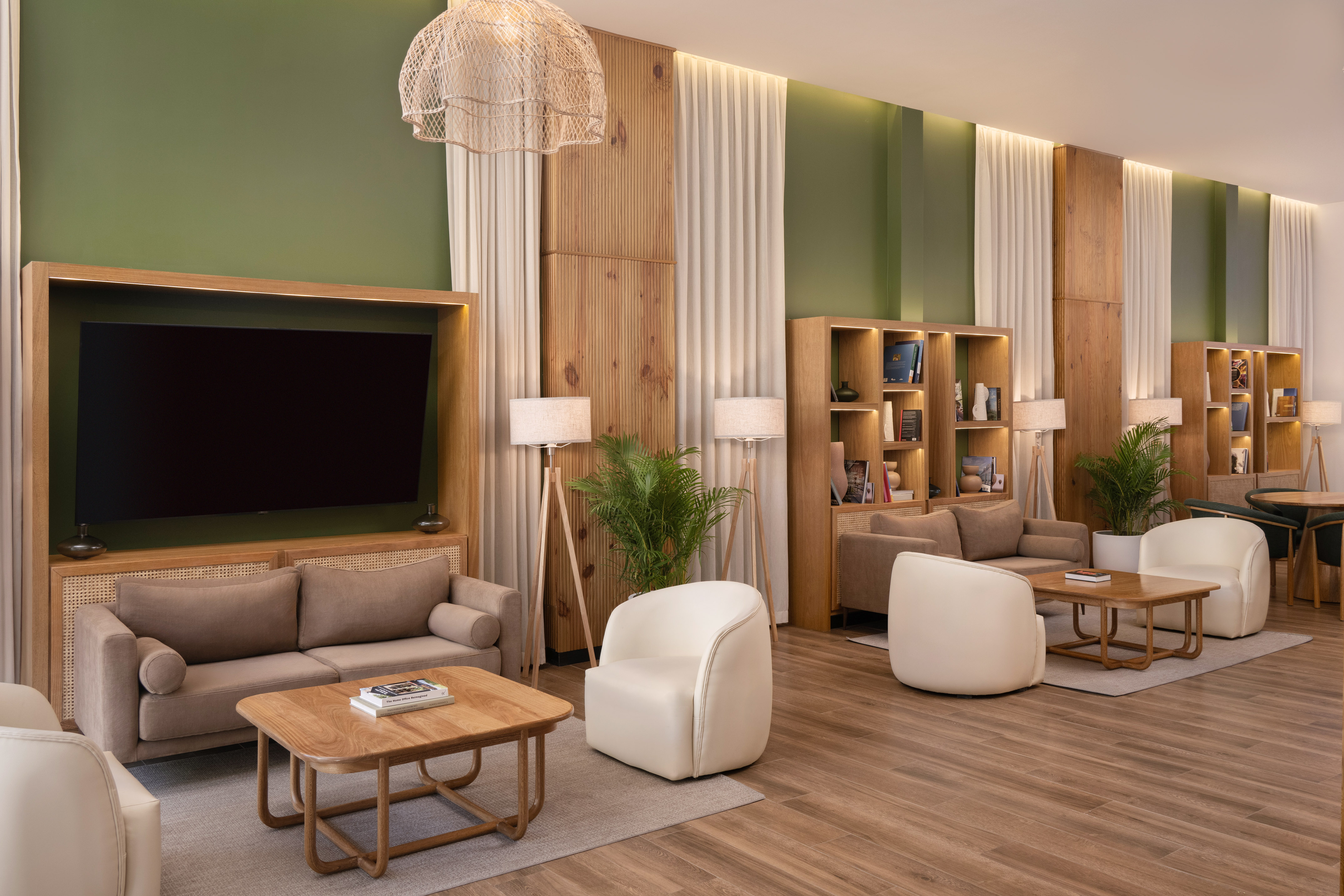 a room with a tv and couches