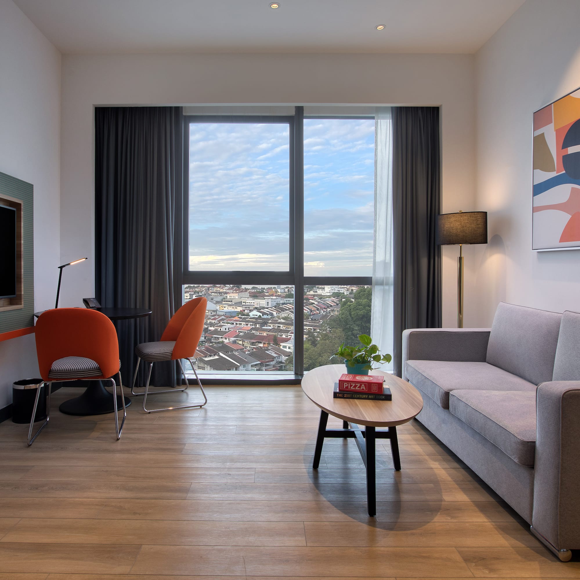 a living room with a couch and a table